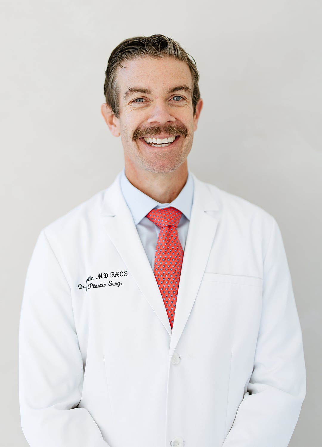 dr benjamin caughlin - Facial Plastic Surgeon Chicago - Impressions face + body Chicago